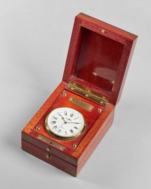 A Swiss brass-bound mahogany quartz deck watchSigned Luxor, No. 1784285, circa 1978The double hinged case with top cover opening to reveal the glazed