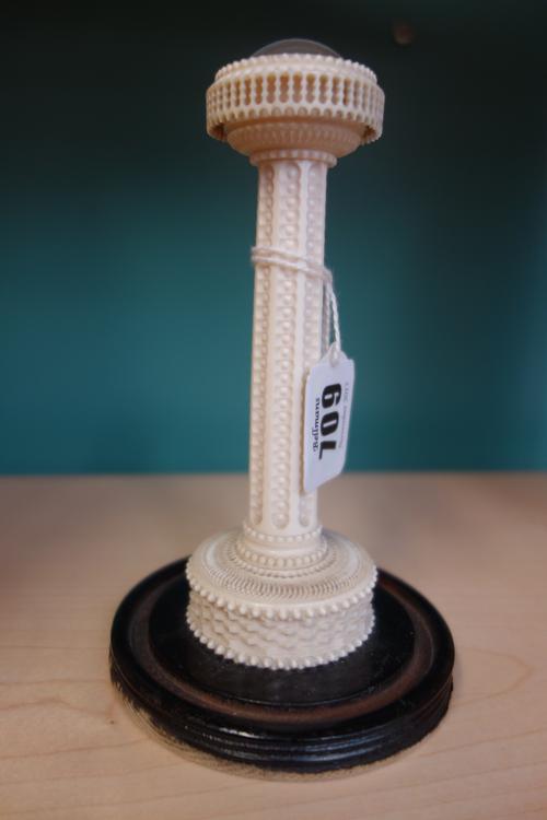 A late Victorian ivory tower thermometer and inset compassBy T. Straight, London, circa 1890The compass scale below a convex glass, with pierced surro