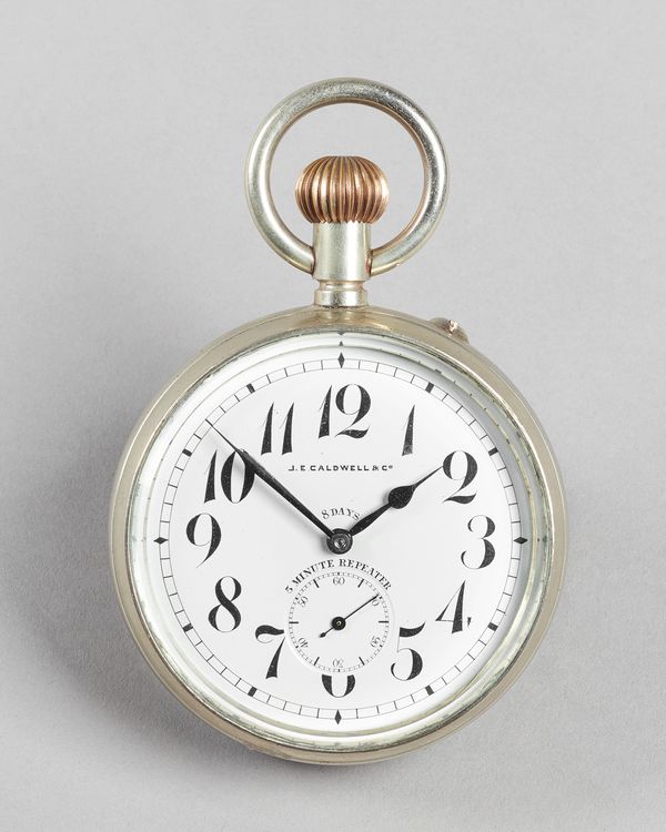 A Swiss nickel cased five-minute repeating open faced keyless eight-day desk watchCirca 1900The enamel dial inscribed 'J. E. Caldwell & Co'. below the