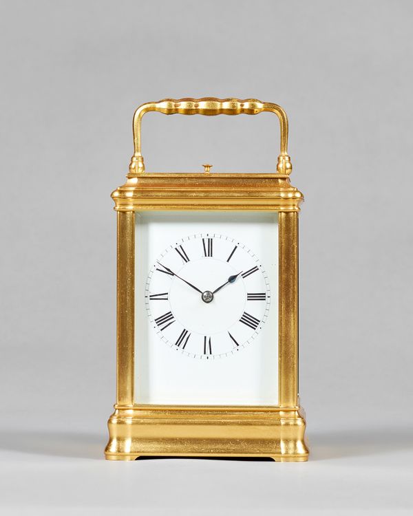 A French gilt brass carriage clock Possibly by Henri Jacot, Paris, circa 1890The Gorge case with a large square top bevelled glass and four further be