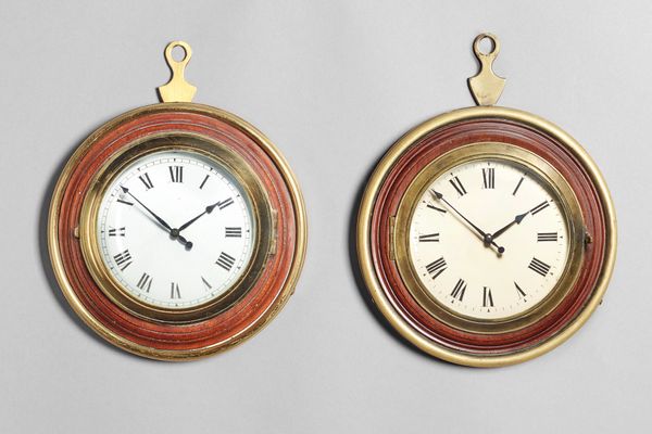 A brass and mahogany Sedan timepieceThe movement by Hawley's, London No. 1095The case with a brass suspension ring, with brass surround and bezel, rin