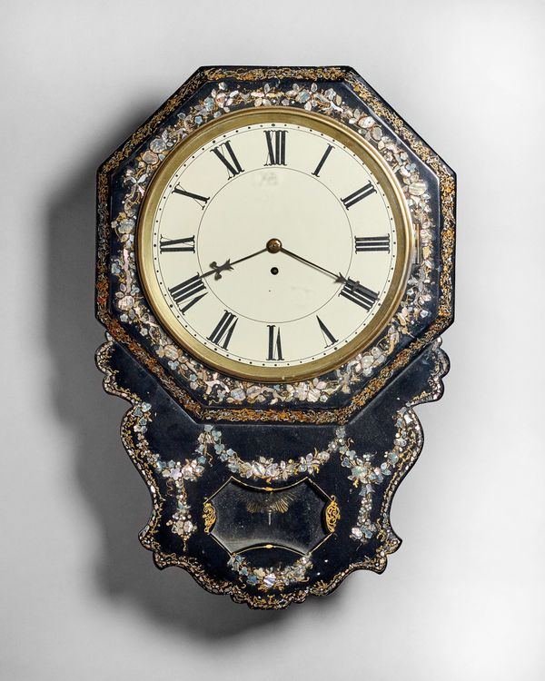 A Victorian parcel-gilt, ebonised and mother-of-pearl decorated octagonal drop-dial timepieceCirca 1870The case with a chamfered dial surround, glazed