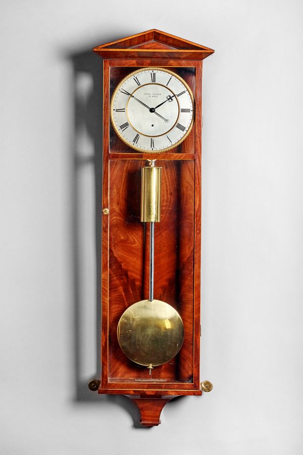 A Viennese mahogany and boxwood outlined wall regulator 'Dachluhr'By Peter Peuker, Wien, circa 1845The six-glazed panel case with an architectural ped