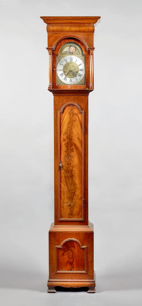 A mahogany longcase clockof small size, Circa 1930The hood with a stepped rectangular pediment, above a glazed door flanked to each side by a column,