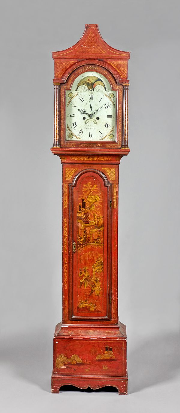 A George III parcel-gilt red lacquer longcase clockThe movement by B. Russell,  NorwichThe arched pediment above a glazed panel door, flanked to each