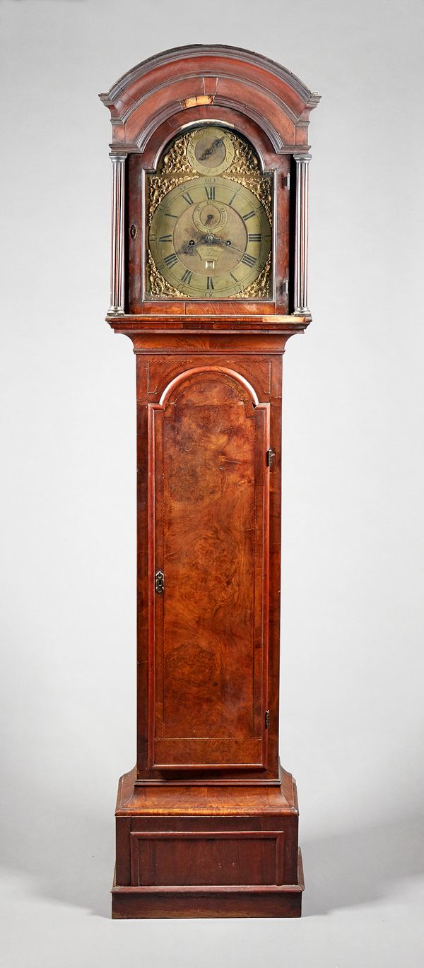 A late George II walnut and chequer strung longcase clockBy William Skeggs, Rotherhith, circa 1750The case with a broken arched pediment above a glaze