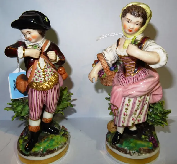 A pair of Derby Stephenson and Hancock porcelain figures, late 19th century, modelled as gallant and companion on naturalistic circular bases, puce pa