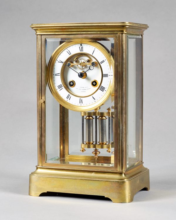 A French gilt brass four-glass mantel clockRetailed by Payne & Co, New Bond Street, London, circa 1880The rectangular case with moulded surround and f