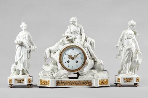 An ormolu-mounted Sèvres biscuit porcelain clock garnitureIn the Louis XVI style, circa 1880The clock modelled with a seated figure of Diane Chasseres
