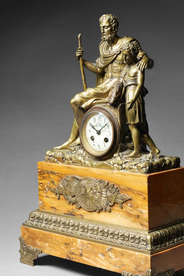 A French gilt bronze and giallo marble mantel clockIn the Empire Revival style, second half 19th centuryModelled with a seated cuirassed figure, a chi