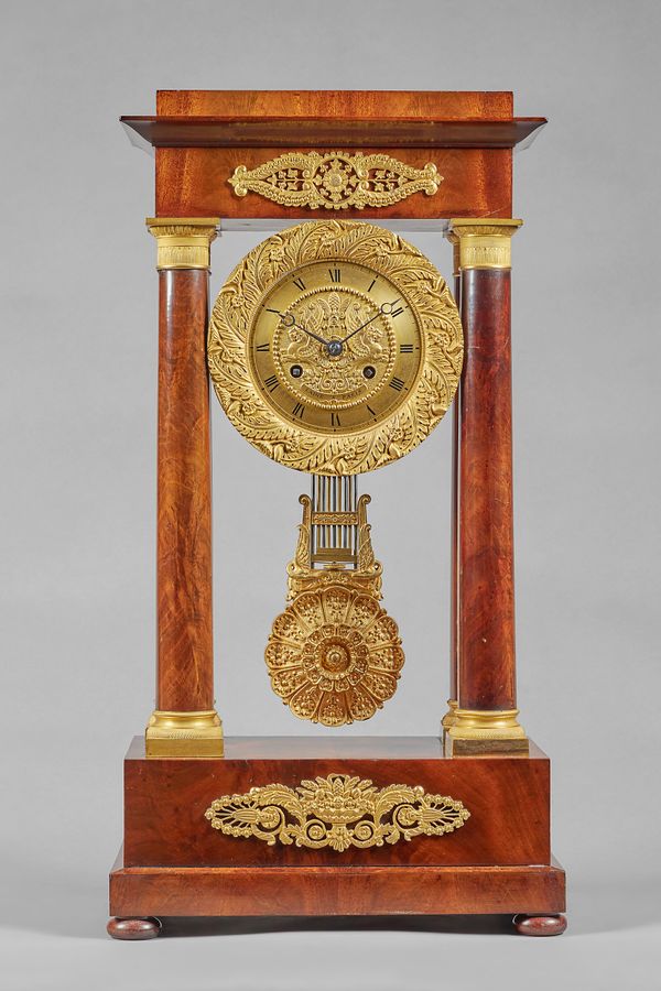 A French ormolu-mounted mahogany Second Empire mantel clockIn the Neo-Classical style, by Laine, Paris, circa 1855The case in the form of a portico, t