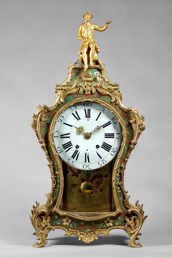 A French or Swiss ormolu-mounted brass and stained-horn veneered quarter striking and repeating bracket clockIn the Louis XV style, First half 19th Ce