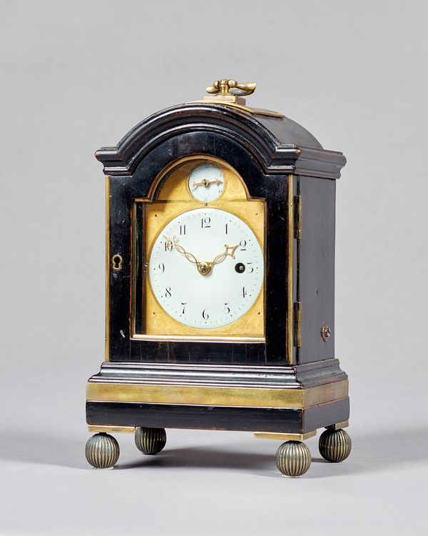 An interesting George III ebonised and brass-mounted timepieceRetailed by Haley & Milner, London, The movement by John Thwaites, No. 992, circa 1780Th