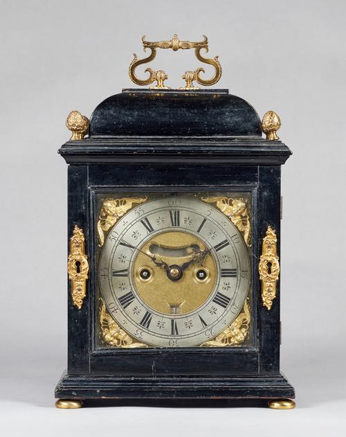 A gilt metal-mounted ebonised quarter repeating table clockBy John Dickings, London, late 17th century and laterThe case now with a caddy top, surmoun