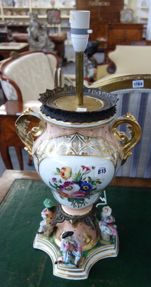 A pair of Czech porcelain vases painted with floral panels, the bases applied with rustic figures, now converted into lamps, with shades, the vases 39