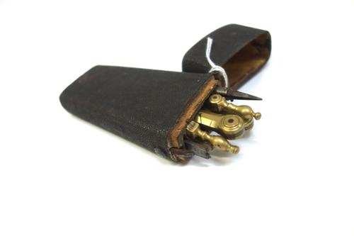 An 18th century shagreen bound wooden etui , with hinged lid opening to reveal a fitted interior, enclosing brass and steel drawing instruments, case