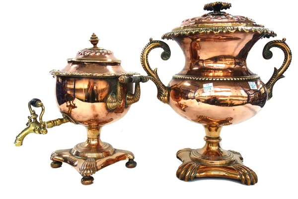 A Victorian copper and brass mounted samovar with turned wooden handles and a brass spout on a shaped square base and four bun feet (31cm high) and an