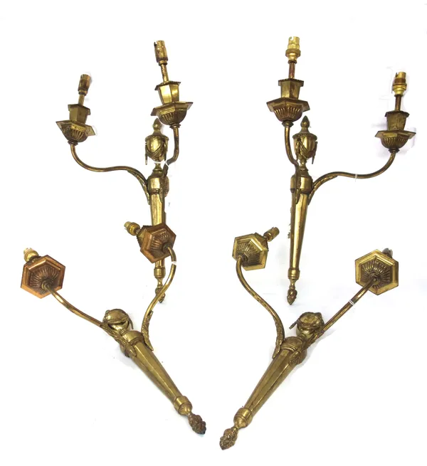 A set of four Adam style gilt brass two branch wall lights, 20th century, with urn finial over a tapering faceted backplate, 35cm, and a pair of Rococ