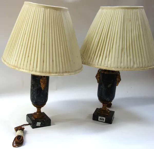 A pair of French green vein marble and ormolu mounted table lamps, late 19th century, each of urn form, with portrait handles and square bases, 52cm h