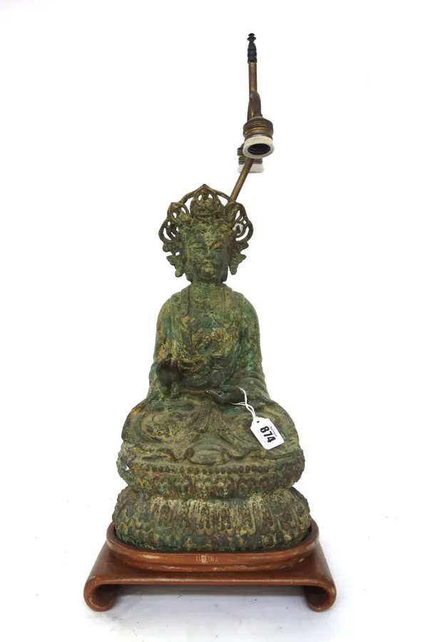 A South East Asian bronze of a seated deity, 20th century, seated on lotus throne and holding a small vase, 40cm. high; together with a bronze figure