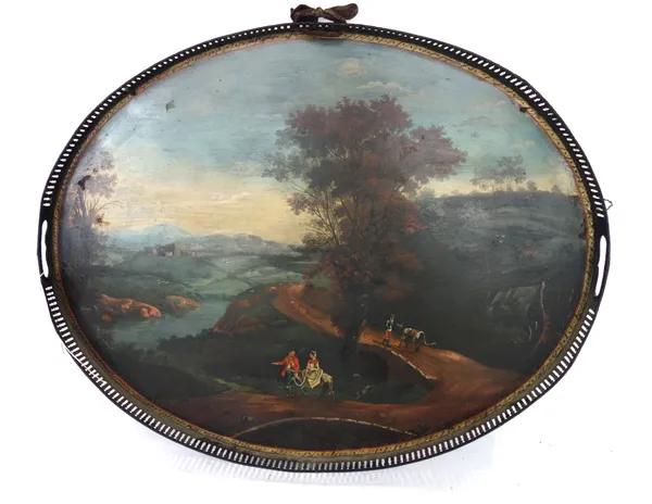 A polychrome decorated tole piente tray, c.1820, of oval two handled form with a pierced gallery painted with figures and donkeys within a landscape,