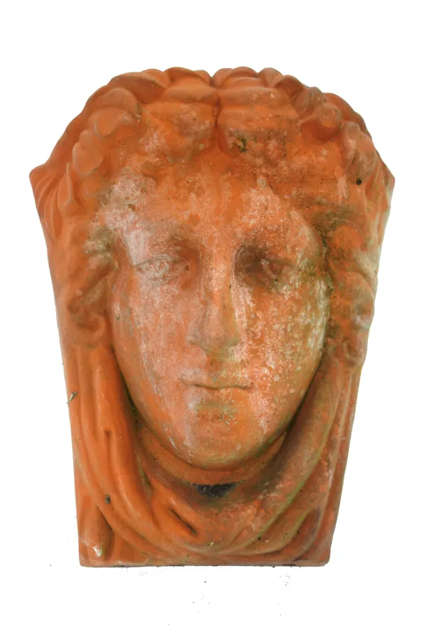 A modern terracotta wall pocket moulded with the head of a classical figure (30cm high), a modern terracotta wall fountain, a Gothic style wooden pane