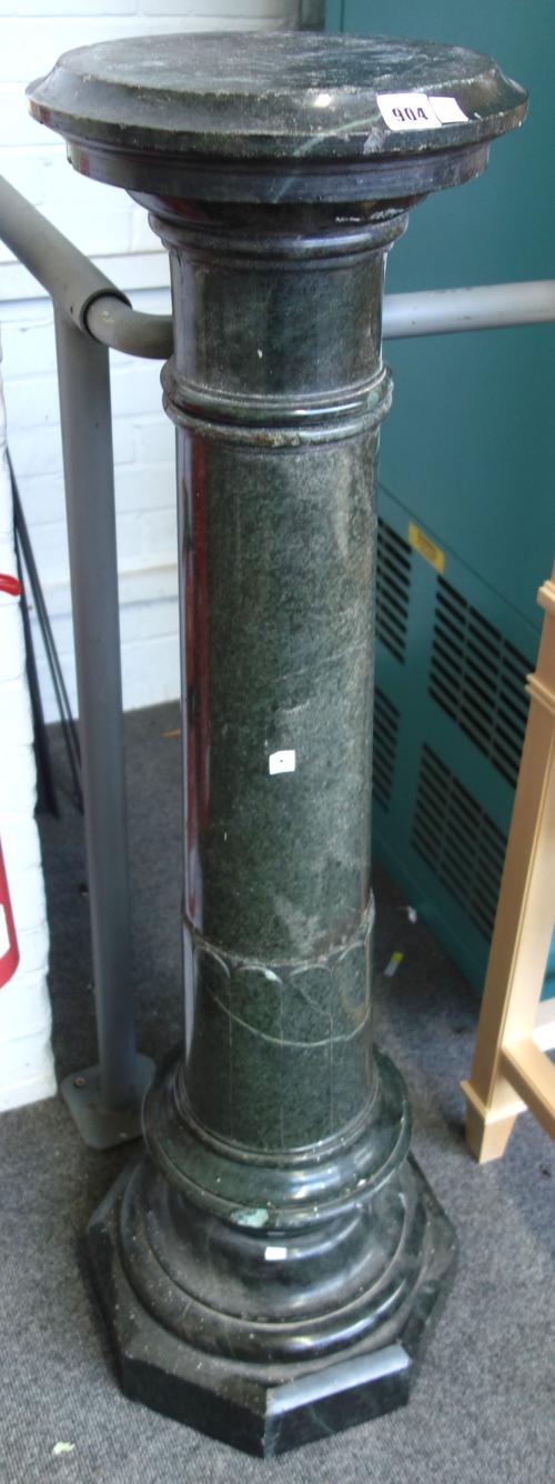 A Victorian serpentine marble pedestal, 19th century, of sectional form on an octagonal base, (a.f).