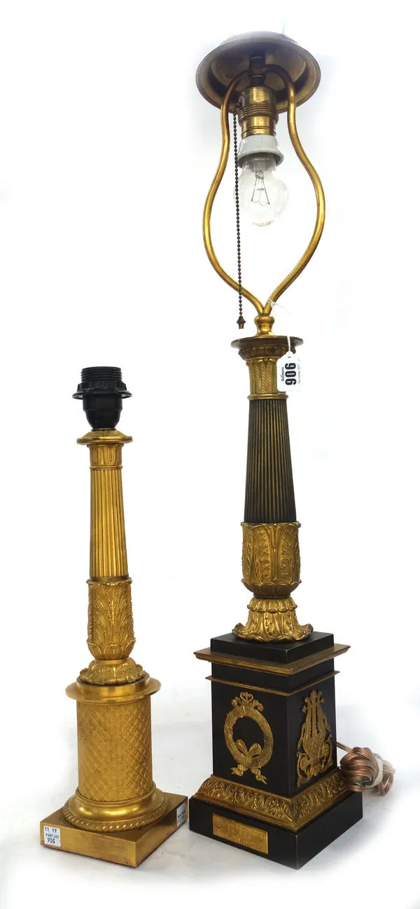 A French gilt and patinated bronze table lamp of fluted column form, titled to the base 'Place des Victoires No1 GOTTEN Inventeur Brevete' (47cm high)