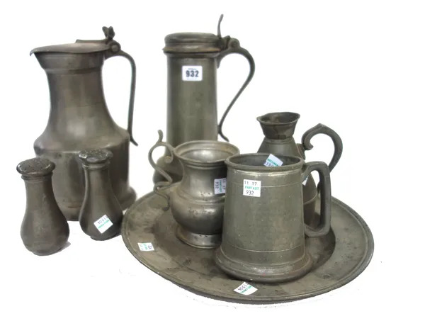 An early 19th century pewter tappit hen with hinged cover, 28cm high, another similar, an Irish pewter flagon, an early 19th century pewter plate and