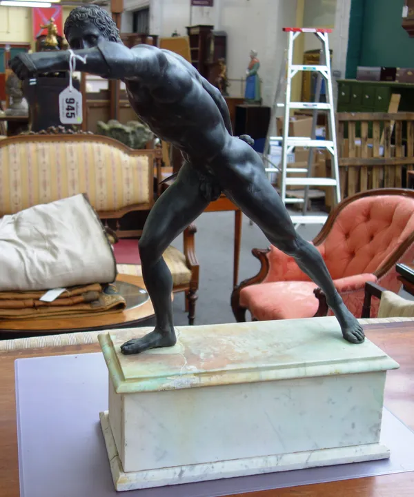 After the Antique, a French patinated bronze figure of a gladiator, late 19th century, modelled naked with sword in his right hand, on a white marble