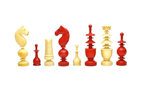 A French stained ivory 'Regence' pattern chess set, 19th century, of turned form, the Kings with crown finials, bishops with canted knops, (a.f), King