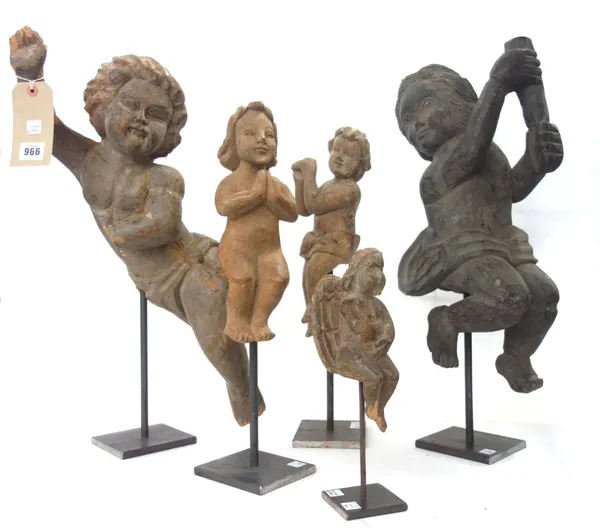 A group of six French carved wooden casting moulds of Putto, varying poses, the largest 58cm, (6).