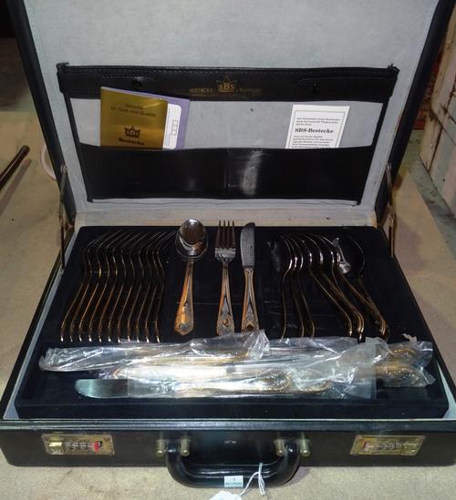 'Bestecke' plated flatware, in a fitted leather case. S2