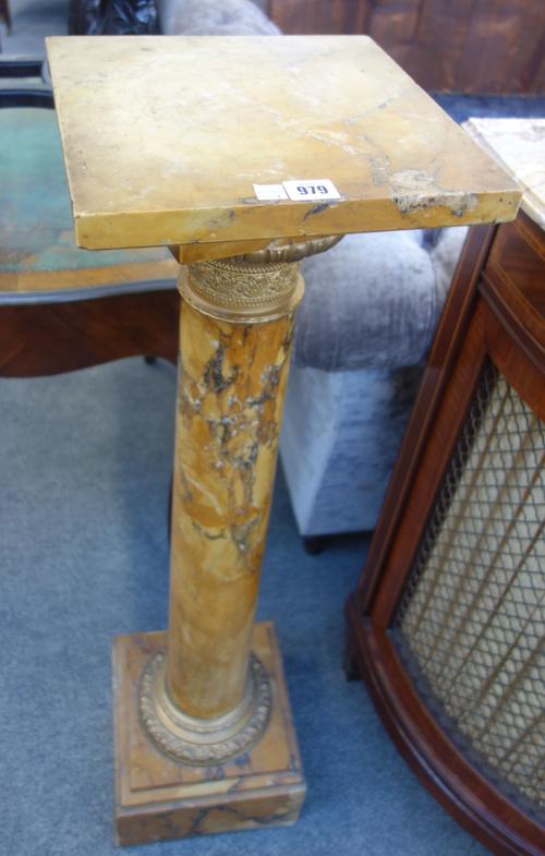 An ormolu mounted Sienna marble pedestal  with square top over a circular tapering centre and square base, 107cm high.