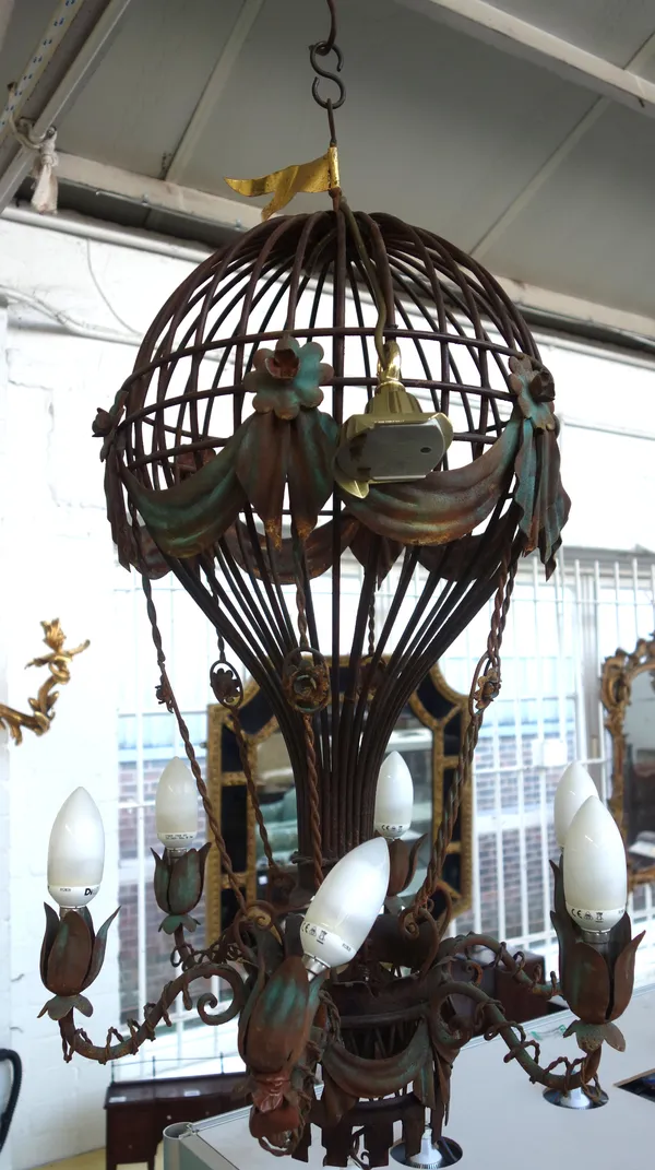A modern painted wrought iron six branch chandelier, modelled as the Montgolfier brother's hot air balloon, 75cm high.