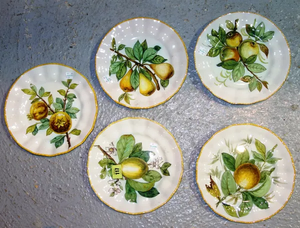 A group of five Cantagalli tin glazed dessert plates painted with fruit, cockerel mark, 22cm. diameter.CAB