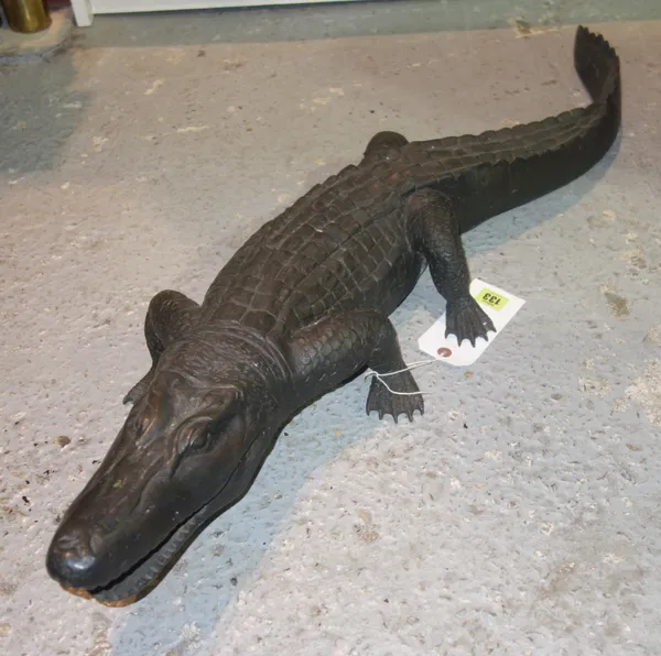 A modern bronze water feature modelled as a crocodile, 106cm.   G5