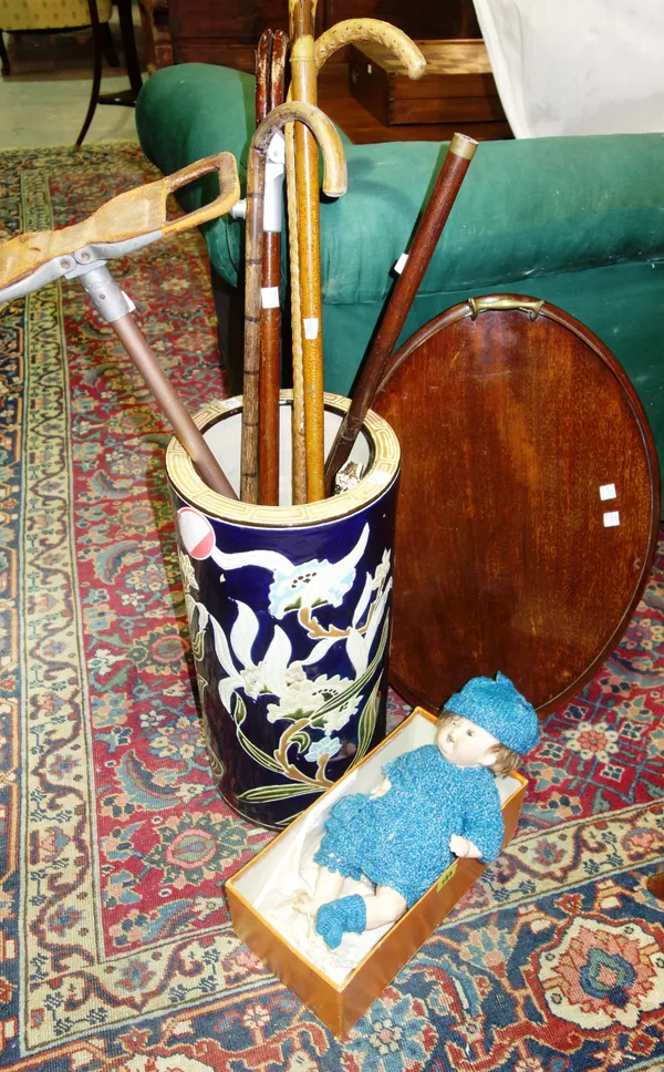 Collectables including; a German bisque head doll, an oval mahogany galleried tray, a 20th century Chinese style stick stand and an group of sticks, (