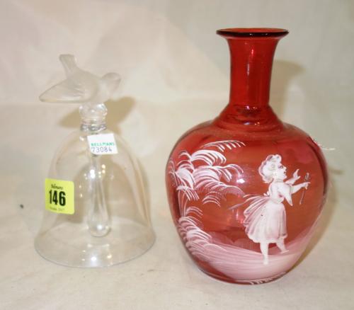 A Lalique frosted and clear glass hand bell, with songbird finial and a Mary Gregory style painted glass bottle, (2).   CAB