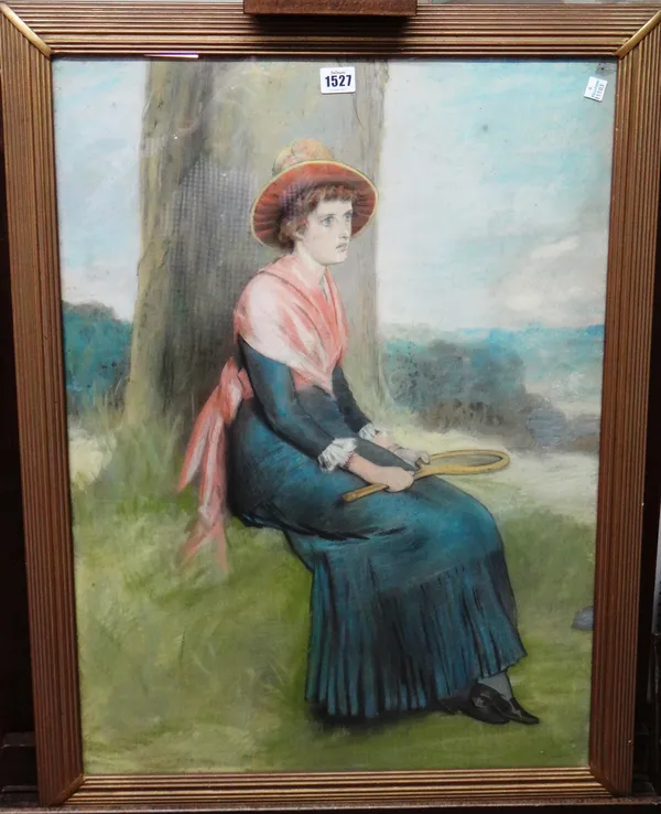 English School (early 20th century), A young girl seated beneath a tree holding a tennis racquet, pastel, 70cm x 51cm.