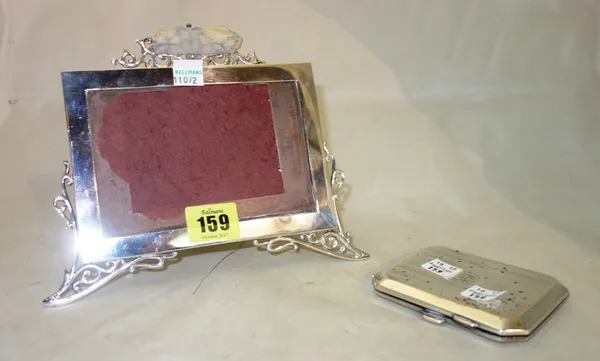 A silver rectangular photograph frame, with pierced surmount and wire work feet, (a.f), stamped London 1904, Mappin & Webb and a silver cut cornered c