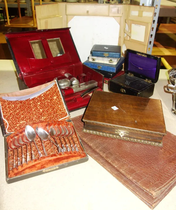 Silver plated cased flatware, including tea and coffee spoon sets, a travelling leather bound writing pad and sundry.S3M
