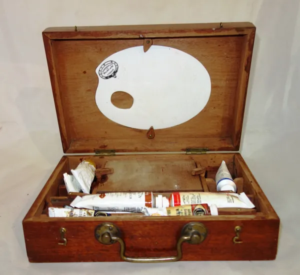 An early 20th century mahogany cased portable painting set, including a ceramic palette, C. Roberson & Co.  S4T