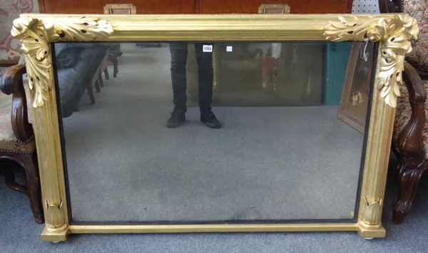 An early Victorian gilt framed rectangular overmantel mirror, with reeded frame and proud acanthus corner brackets, 135cm wide x 87cm high.