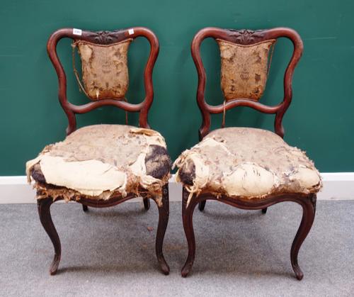 Wooley; a set of six Victorian rosewood framed dining chairs, each with shaped semi-padded back and serpentine seat on cabriole supports, 48cm wide x