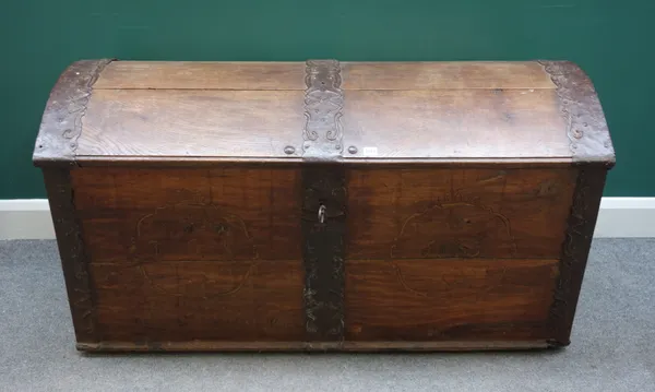 A 19th century French metal banded oak dome top trunk, 137cm wide x 72cm high x 65cm deep.