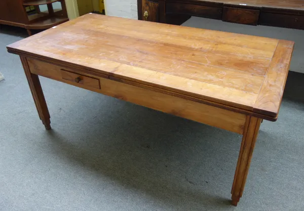 A 19th century French fruit wood rectangular extending draw leaf table on square supports, 92cm wide x 180cm long x 360cm long extended x 76cm high.