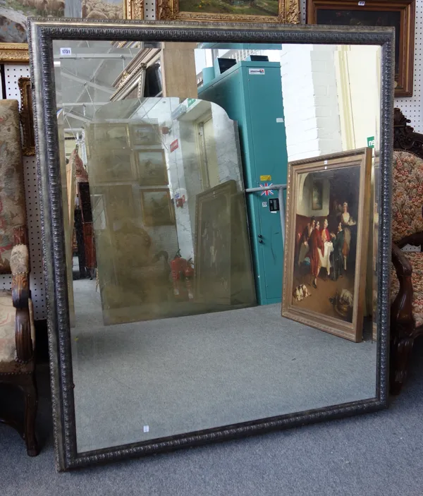 A 20th century silver rectangular wall mirror, with egg and dart moulded frame and bevelled mirror plate, 130cm wide x 150cm high.