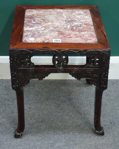 A late 19th century Chinese square carved hardwood jardiniere stand with marble inset top, 38cm wide x 48cm high.