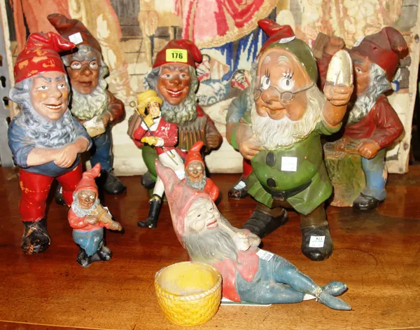A group of nine gnomes and a Johnny Walker figure, (10).   G4